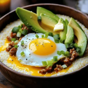 To make a great grits breakfast bowl, you need a few key items. These ingredients make it tasty and filling. Here is what you will need: - 1 cup white or yellow grits - 4 cups water or vegetable broth - 1 cup shredded sharp cheddar cheese - 2 tablespoons butter - 4 large eggs - ½ cup cooked and crumbled turkey sausage or plant-based sausage - 1 avocado, sliced - ¼ cup green onions, chopped - Salt and pepper to taste - Hot sauce (optional) These items create a rich base for your bowl. The grits provide creaminess, while the cheese adds flavor. You can use water for a simple dish, or broth for more depth. Grits are very versatile. You can customize them with your favorite toppings. Some great options include: - Sautéed mushrooms - Spinach or kale - Diced tomatoes - Black beans Each mix-in adds a new taste and texture. Feel free to get creative! You can even add leftovers from last night’s dinner for extra flavor. Choosing the right cheese and sausage is key. For cheese, sharp cheddar works well, but you can try: - Gouda - Pepper jack - Cream cheese Each choice gives a different flavor profile. For sausage, turkey sausage is a great option. You can also use: - Plant-based sausage for a vegetarian twist - Andouille sausage for a spicy kick These options help you make the dish your own. With the right ingredients, your grits breakfast bowl will shine. For a full recipe, check the details above. Enjoy your cooking! Start by boiling water or vegetable broth in a medium saucepan. Once it boils, whisk in the grits slowly. Stir to keep lumps away. Lower the heat and let them cook. Stir every now and then for about 20-25 minutes. You want them creamy. When almost done, mix in butter and shredded cheddar cheese. Add salt and pepper to taste. In a non-stick skillet, cook the eggs sunny-side up or over-easy. It’s all about what you like best. In the same skillet, toss in the crumbled sausage. Cook it until it's warm and a bit crispy. This adds flavor and texture to your bowl. Grab your favorite bowls. Spoon the creamy grits into the bottom of each bowl. Next, add the cooked sausage and place a fried egg on top. Slice the avocado and arrange it nicely. Finish with chopped green onions and a dash of hot sauce if you like a little heat. For the full recipe, refer to the earlier section. Enjoy your hearty meal! To make creamy grits, start with good quality grits. Use white or yellow grits based on your taste. Always rinse the grits before cooking. This helps remove any dust and makes them smoother. Use a mix of water and broth for rich flavor. Boil the liquid first, then whisk in the grits. Stir well to avoid lumps. Cook them on low heat for about 20-25 minutes. Stir occasionally to keep them creamy. Add butter and cheese at the end for extra creaminess. Eggs are key to a great Grits Breakfast Bowl. You can fry, scramble, or poach them. For sunny-side-up eggs, heat a non-stick pan and crack the eggs in. Cook gently for a few minutes until the whites set. If you like scrambled eggs, whisk them in a bowl with some salt. Cook in a pan over medium heat, stirring constantly until they are fluffy. Poached eggs are another tasty option. Bring water to a gentle simmer, crack in the egg, and cook for 3-4 minutes. Each method adds a unique touch. To improve texture, use more broth for a thinner consistency. If you prefer thicker grits, reduce the liquid. For flavor, add spices like garlic powder or smoked paprika during cooking. Fresh herbs like thyme or parsley can also enhance taste. Don’t forget to season your grits with salt and pepper. Top your bowl with green onions for a nice crunch. Optional hot sauce can add a spicy kick. Mix and match these tips for the perfect Grits Breakfast Bowl. Check out the Full Recipe for more details! {{image_2}} You can easily make a vegetarian or vegan grits breakfast bowl. Start with the basic recipe, but swap the meat for plant-based sausage. For a vegan version, use olive oil instead of butter. Replace cheese with a vegan cheese option or nutritional yeast for a cheesy taste. You can also add sautéed veggies like spinach or mushrooms for more flavor and nutrition. Grits fit into many global cuisines. For a Mexican twist, mix in black beans, corn, and pico de gallo. You can add spices like cumin and chili powder for extra kick. In Italy, try adding marinara sauce and a sprinkle of Parmesan cheese for a comforting meal. In the South, stir in collard greens and hot sauce to keep things classic. Seasonal ingredients can elevate your grits bowl. In spring, add fresh asparagus or peas for a bright touch. Summer is perfect for ripe tomatoes and basil, giving a fresh burst of flavor. In fall, consider roasted squash or pumpkin to add warmth. Winter calls for hearty greens like kale or Swiss chard, giving you a robust, filling dish. To store leftover grits, let them cool first. Place them in an airtight container. You can keep them in the fridge for up to three days. If you want to store them longer, freeze the grits. They will stay good in the freezer for up to three months. Just remember to label the container with the date. When you're ready to eat the leftover grits, you can reheat them easily. For the best results, add a splash of water or broth to the grits. This helps bring back their creamy texture. Heat them in a saucepan over low heat. Stir often until they warm through. You can also use the microwave. Place the grits in a bowl, cover it, and heat for 1-2 minutes. Stir halfway for even heating. Meal prep makes mornings easier. You can cook a big batch of grits ahead of time. Store them in individual containers for quick meals. Pre-cook the sausage and eggs too. Store them separately until you are ready to eat. When it's time for breakfast, just heat everything up and assemble your bowl. This method saves time and keeps your breakfast fresh and tasty. For the full recipe, check out the Grits Breakfast Bowl Delight. The best types of grits are white or yellow. White grits are smooth and creamy. Yellow grits have a nuttier flavor. Both types work well in a grits breakfast bowl. I often use white grits for their rich texture. However, yellow grits add a nice color to the dish. Choose based on your taste and preference. Yes, you can make the grits breakfast bowl ahead of time. Cook the grits and store them in the fridge. They will last about three days. When you are ready to eat, reheat them on the stove. Add a splash of water or broth for moisture. Cook the eggs and sausage fresh for the best taste. This way, you enjoy a hot meal without much fuss. You can swap cheese and sausage for many options. For cheese, you can use mozzarella or feta. These options give different flavors and textures. For sausage, try diced ham or bacon. For a vegetarian choice, use mushrooms or beans. You can even use plant-based sausage for a vegan option. Get creative and mix flavors you love! This article covered how to make a tasty grits breakfast bowl. We discussed the key ingredients, cooking tips, and various fun toppings. You learned how to cook grits and combine them with eggs and sausage. Remember, you can customize it with different flavors and styles. Try out vegetarian or international versions to keep it fresh. Now, with these easy steps and ideas, enjoy creating your perfect breakfast bowl!