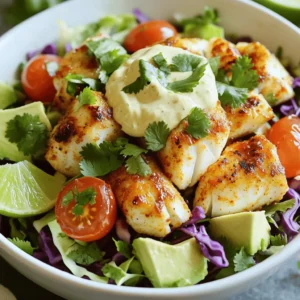 For these tasty fish taco bowls, you need a few key ingredients: - 1 lb white fish fillets (like cod or tilapia) - 2 tablespoons olive oil - 1 teaspoon chili powder - 1 teaspoon cumin - 1 teaspoon garlic powder - 1 teaspoon onion powder - Salt and pepper to taste - 1 medium avocado, diced - 1 cup shredded cabbage (green or purple, or both) - 1/2 cup cherry tomatoes, halved - 1/4 cup fresh cilantro, chopped - 2 tablespoons lime juice - 1/2 cup crema or Greek yogurt (for serving) These ingredients work together to create a fresh and flavorful meal. The fish brings protein and healthy fats. Cabbage adds crunch, while avocado adds creaminess. Lime juice brightens the dish, making every bite refreshing. To kick up the flavor, you can add: - Sliced jalapeños for heat - Extra lime wedges for more zing - A sprinkle of queso fresco for creaminess - Sliced radishes for extra crunch These optional ingredients allow you to customize your bowls. Add more heat or creaminess based on your taste. Play with flavors to make your bowl unique. These low carb fish taco bowls are not only delicious but healthy too. Each serving has about: - Calories: 350 - Protein: 30g - Carbohydrates: 15g - Fats: 20g This meal is light but filling. It fits well into low-carb diets while providing nutrients. You can enjoy a great meal without guilt. Remember, you can find the full recipe in the section above. Start by heating your grill or skillet to medium. Take one pound of white fish fillets, like cod or tilapia. Drizzle two tablespoons of olive oil over the fish. This helps the spices stick. Season both sides with one teaspoon of chili powder, cumin, garlic powder, onion powder, salt, and pepper. Mix these spices well. Now, place the fillets on the hot grill or skillet. Cook for about three to four minutes on each side. You want the fish to be opaque and flaky. When it’s done, remove it from heat. Let it rest for a minute. After that, break it into chunks. While the fish cooks, prepare the bowl base. In a large bowl, mix one cup of shredded cabbage, one diced avocado, and half a cup of halved cherry tomatoes. Add a quarter cup of chopped cilantro. Drizzle two tablespoons of lime juice over this mixture. Toss gently to combine. Now, it's time to build your taco bowl. Divide the cabbage mixture into serving bowls. Top each bowl with the chunks of grilled fish. For a rich finish, add a dollop of crema or Greek yogurt on top. If you like heat, sprinkle sliced jalapeños as well. Enjoy your low carb fish taco bowls right away! For a complete guide, check the Full Recipe. To make your low carb fish taco bowls shine, focus on seasoning. Use fresh lime juice to brighten flavors. Don’t skip the chili powder and cumin—they add depth. For a burst of flavor, add fresh herbs like cilantro. You could also mix in diced jalapeños for heat. Feel free to play with toppings, like avocado and cherry tomatoes. One common mistake is overcooking the fish. Cook until the fish is opaque and flakes easily. Also, don’t forget to season both sides of the fillets. Skipping this step can leave your dish bland. Lastly, avoid soggy veggies; use fresh cabbage and serve immediately. This keeps everything crisp and vibrant. I recommend using a good non-stick skillet or a grill. This keeps the fish from sticking and makes flipping easy. A sharp knife helps with dicing veggies and herbs. Use a large bowl for mixing the cabbage and other toppings. A fish spatula is perfect for handling delicate fish fillets without falling apart. For more detailed steps, check the full recipe. {{image_2}} If you want a vegetarian option, try using grilled zucchini or portobello mushrooms. Both add great texture and flavor. You can also use chickpeas for a protein boost. Just season them with the same spices. Toss them in olive oil and roast for a crispy finish. You won't miss the fish at all. While I love cod and tilapia, you can try other fish too. Salmon gives a rich taste. Mahi-mahi offers a firm texture that holds up well. You might also enjoy shrimp for a fun twist. Just adjust the cooking time based on the fish you choose. Toppings can change your taco bowl game. Try adding pickled red onions for tang. Fresh mango salsa adds sweetness and color. You can also use radishes for crunch. Serve with cauliflower rice or a side salad for extra veggies. Don't forget a squeeze of lime for that burst of freshness. For the full recipe, check out the Low Carb Fish Taco Bowls section. Store any leftover fish taco bowls in an airtight container. Keep them in the fridge. They stay fresh for about two days. Make sure to separate the fish from the veggies. This helps keep the cabbage crunchy. When you're ready to eat, reheat the fish gently. Use a skillet over low heat. You can also microwave it for about 30 seconds. Add a splash of water to help steam it. This keeps the fish moist. Avoid reheating too long, or it will dry out. You can freeze the fish if you have extra. Place it in a freezer-safe bag. Make sure to remove as much air as possible. It can last up to three months. However, I do not recommend freezing the veggies. They won't taste fresh after thawing. When you're ready to eat, thaw the fish overnight in the fridge. This keeps it safe and flavorful. For the best taste, enjoy your low carb fish taco bowls fresh. For the full recipe, see above! The best fish for low carb taco bowls includes cod and tilapia. Both fish are mild and flaky. They soak up spices well and grill nicely. You can also use halibut or mahi-mahi for a different taste. These options keep your meal light and flavorful. Yes, you can make parts of this recipe ahead of time. Cook the fish and store it in the fridge for up to two days. Prepare the cabbage mix and toppings earlier too. Just keep them separate until you are ready to serve. This way, you save time on busy days. Great low-carb toppings for your fish taco bowls include: - Sliced avocado - Shredded cabbage - Cherry tomatoes - Fresh cilantro - Lime wedges - Jalapeños for some spice These toppings add color and flavor. They also help keep your meal healthy and low in carbs. For a creamy touch, try crema or Greek yogurt. You can find the full recipe [here](#). In this article, we covered key ingredients for low-carb fish taco bowls and how to make them. You learned how to prepare fish, cook it well, and assemble your bowl. I shared tips to enhance flavor and avoid common mistakes. You also found variations for vegetarian options, different fish choices, and various toppings. Lastly, we discussed how to store and reheat your leftovers. Low-carb fish taco bowls are tasty and easy to make. Enjoy your cooking!
