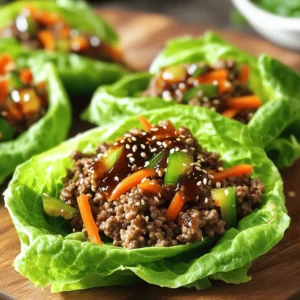 - Ground Beef: Choosing the Right Fat Content Ground beef comes in various fat levels. For these wraps, I prefer 80/20 ground beef. It has enough fat to keep the meat juicy without being greasy. Leaner beef can dry out. Always check the label for quality. - Fresh Vegetables: Carrots, Bell Peppers, and Green Onions Fresh veggies add crunch and color. I use one cup of finely shredded carrots. They bring sweetness. For bright color, I add a diced bell pepper. Red or yellow works best. Green onions add a fresh bite and a pop of color. - Flavor Enhancers: Soy Sauce, Hoisin Sauce, and More These sauces are key for flavor. I use two tablespoons of soy sauce for umami. One tablespoon of hoisin sauce adds sweetness. A teaspoon of sesame oil gives a nice nutty touch. Garlic and ginger also boost the taste profile. This combination of ingredients makes your wraps delicious. For the full recipe, check the details above. How to Prepare the Lettuce Leaves To prepare the lettuce leaves, first, wash them under cold water. Gently pat them dry with a paper towel. Choose Romaine for its sturdy structure. This type holds the filling well and adds a nice crunch. Separate the leaves carefully to avoid tearing. You want each leaf to be a perfect cup for your filling. Tips for Sautéing Aromatics Sautéing aromatics is key to adding flavor. Start with a hot skillet. Add a splash of oil, then toss in minced garlic and ginger. Stir them quickly to prevent burning. Cook for about two minutes until fragrant. This step builds the base for your dish and wakes up your taste buds. Efficient Cooking Techniques for Ground Beef When cooking ground beef, use medium-high heat. This helps it brown nicely. Break the meat apart with a spatula as it cooks. This ensures even cooking and a nice texture. Drain any excess fat if needed. Aim for a rich, brown color for the best flavor. Detailed Instructions on Browning the Beef Add the ground beef to your hot skillet. Cook it for about 5-7 minutes. Use your spatula to break it into small pieces. Once browned, it’s ready for the next steps. This browning adds a depth of flavor that makes your wraps irresistible. Incorporating Vegetables and Spices After browning the beef, it’s time to add flavors. Pour in soy sauce, hoisin sauce, sesame oil, rice vinegar, and chili paste. Stir well to coat the beef. Then, add shredded carrots and diced bell pepper. Cook for an additional 3-5 minutes. You want the veggies to stay crisp while absorbing the tasty sauce. Final Touches Before Serving Once the mixture is cooked, remove it from heat. Stir in chopped green onion for freshness. This last touch brightens the dish. To serve, take a lettuce leaf and spoon in the beef mixture. Top with sesame seeds for a nice crunch. Enjoy your delicious hand-held treat! For the complete recipe, see the Full Recipe section. Adjusting Flavor: Balancing Sweetness and Spice To make the best Asian-style ground beef lettuce wraps, you want a good mix of sweet and spicy. Taste your filling as you cook. If it’s too sweet, add more soy sauce. If it lacks heat, add more chili paste. This will help you find the right balance. Maintaining Crispness in Vegetables Crisp vegetables make your wraps exciting. To keep them crunchy, add the carrots and bell peppers near the end of cooking. Stir them in and cook just long enough to warm them up. This keeps their texture vibrant. Creating a Dipping Sauce: Optional Additions A dipping sauce can elevate your wraps. Mix soy sauce with a bit of rice vinegar. For extra flavor, add minced garlic or a dash of sesame oil. You can also try mixing hoisin sauce with lime juice for a fun twist. Skillet vs. Wok: Which is Best? You can use either a skillet or a wok for these wraps. A skillet is great for beginners. It heats evenly and is easy to use. A wok, on the other hand, cooks food fast and gives it a nice char. Choose what feels comfortable for you. Preparing Ahead: Meal Prep Tips for Busy Days If you’re busy, prepare the filling ahead of time. Cook the ground beef mixture and store it in the fridge. You can then quickly assemble the wraps when you’re ready to eat. This saves you time and keeps your meal fresh. Check out the Full Recipe for more details. {{image_2}} Using Ground Chicken or Turkey If you want a lighter option, try ground chicken or turkey. Both meats have less fat than ground beef. They still soak up the flavors well. Just use the same cooking method. Cook them until they are no longer pink. This keeps the dish tasty and healthy. Vegetarian Option: Substitutes for Ground Beef For a vegetarian twist, use mushrooms or lentils. Finely chop mushrooms for a meaty texture. Cook them the same way as ground beef. Lentils can also work well; just cook them until soft. Season with soy sauce and hoisin sauce to keep the flavor strong. Spicy Version: Adding More Heat To boost the heat, add more chili paste. You can also include sliced fresh chili peppers. Mix them into the beef while cooking. This adds a spicy kick that many will enjoy. Adjust the amount based on your spice preference. Sweet and Savory: Including Pineapple or Water Chestnuts Add pineapple chunks for a sweet touch. They balance the savory flavors in the dish. Water chestnuts bring a nice crunch too. Chop them finely and stir them in with the vegetables. This creates a delightful mix that makes each bite exciting. For the full recipe, check out the Asian-Style Ground Beef Lettuce Wraps. To keep your Asian-style ground beef lettuce wraps fresh, follow these steps: - Best Practices for Refrigeration: Let the filling cool completely first. Transfer it to an airtight container. Store the lettuce leaves separately to prevent wilting. This way, they stay crisp and fresh. - How Long Do They Last in the Fridge?: Properly stored, the filling lasts for about 3 to 4 days in the fridge. The lettuce leaves, however, are best eaten within a day or two for optimal crunch. When you're ready to enjoy your leftovers, here are my tips: - Optimal Methods to Retain Texture and Flavor: Reheat the filling in a skillet over medium heat. Stir it gently until it warms through. This keeps the flavors vibrant and helps maintain the texture. - Can You Freeze Lettuce Wrap Filling?: Yes, you can freeze the ground beef filling. Place it in a freezer-safe container. It can stay fresh for up to 3 months. Just remember to thaw it in the fridge overnight before reheating. For the full recipe, check out the detailed instructions above. Enjoy your wraps! How Can I Make These Wraps Ahead of Time? You can prepare the filling a day in advance. Just store it in the fridge. Keep the lettuce leaves separate to stay crisp. When ready to eat, assemble the wraps quickly. This saves time and keeps everything fresh. What Are Some Serving Suggestions? These wraps are fun as an appetizer or a main dish. Serve them with a side of rice or noodles. You can add a dipping sauce like sweet chili or peanut sauce for extra flavor. Kids love them, too! Can I Use Other Lettuce Types Besides Romaine? Yes! You can use butter lettuce or iceberg lettuce. Both options work well for wraps. Just ensure the leaves are sturdy enough to hold the filling. Health Benefits of Ingredients Used The ground beef provides protein, which is key for muscle health. Carrots add vitamins and fiber, while bell peppers bring antioxidants. Garlic and ginger boost your immune system. Sesame seeds add healthy fats and minerals. Caloric Breakdown per Serving One serving has about 300 calories. This includes protein from beef and healthy fats from sesame oil. The veggies add low-calorie bulk, making it a filling meal. Enjoy knowing you’re eating something both tasty and healthy! Asian-style ground beef lettuce wraps are easy to make. We covered key ingredients like beef, fresh veggies, and sauces. I shared step-by-step instructions on preparing, cooking, and perfecting these wraps. You learned tips on storage, reheating, and variations to suit your taste. These wraps offer a fun and healthy meal. Experiment with flavors and ingredients. Enjoy your creative cooking and the tasty results!