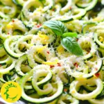- Zucchinis: Use 4 medium zucchinis, spiralized into noodles. This gives a nice texture. - Olive oil: Measure 2 tablespoons of extra virgin olive oil for flavor. - Garlic: Use 2 cloves of fresh garlic, minced. Fresh garlic gives the best taste. - Lemon: The zest of 1 large lemon is key. It adds a bright flavor. Use 3 tablespoons of fresh lemon juice for zest. - Parmesan cheese: Use ½ cup of grated Parmesan cheese. Grated cheese melts well. - Red pepper flakes: Add ¼ teaspoon for some heat, if you like it spicy. - Seasoning: Adjust salt and pepper to your taste. This enhances all the flavors. - Garnish: Fresh basil leaves add color and a fresh touch. To start, pick the right tool for spiralizing. A spiralizer is best, but a vegetable peeler works too. To make ribbons, simply peel the zucchini into thin strips. This method gives a nice texture. Look for firm zucchinis without soft spots. Wash them well before using. Trim off the ends before spiralizing. Heat your skillet to medium heat. Add olive oil and let it warm up. Once hot, toss in minced garlic. Sauté for about 1-2 minutes. Watch closely so the garlic doesn’t burn. Burnt garlic tastes bitter and ruins the dish. You want it to be fragrant and slightly golden. Add your zucchini noodles to the skillet with the garlic. Stir gently to mix them with the oil. Cook for about 2-3 minutes. You want them just tender but still firm, which is called al dente. Overcooking makes them mushy, so keep an eye on them! Once your noodles are ready, it’s time to mix in the flavors. Add lemon zest and lemon juice. If you like a kick, sprinkle in red pepper flakes. Season with salt and pepper to taste. Stir well to blend everything. This step is key for bright, fresh flavors. Now, remove the skillet from heat. Sprinkle grated Parmesan over the noodles. Toss gently to mix; the heat will melt the cheese just right. For a nice touch, plate the noodles right away. Garnish with fresh basil leaves. You can serve them hot or at room temperature. Both options taste great! To make your cooking fast and fun, here are some tools I love: - Spiralizer: This tool makes perfect zucchini noodles. - Vegetable peeler: Use it if you don’t have a spiralizer. - Large skillet: Use it for sautéing garlic and zucchini together. If you want to swap ingredients, there are easy ways to keep flavors strong: - Olive oil: Use any light oil if you run out. - Parmesan cheese: Try a mix of nutritional yeast for a vegan option. - Lemon juice: Swap with lime juice for a different zing. Let’s make your dish pop with more herbs and spices: - Basil: Fresh basil adds a sweet touch. - Oregano: This herb brings warmth to the dish. - Red pepper flakes: If you like spice, keep this in! To make it vegan or dairy-free, use these tips: - Nutritional yeast: It gives a cheesy flavor without dairy. - Coconut cream: Use it for a rich, creamy texture. Pair your zucchini noodles with tasty proteins or sides: - Shrimp: Grilled shrimp adds a savory touch. - Chicken: Grilled chicken works well for heartiness. - Tofu: Stir-fried tofu is a great plant-based option. Think about when to serve this dish: - Lunch: A light meal on a hot day. - Dinner: Perfect for a quick, healthy dinner. - Parties: A fun dish to impress your friends. {{image_2}} You can add protein to your Minute Lemon Parmesan Zucchini Noodles easily. Shrimp, chicken, or tofu all work well. For shrimp, sauté them in the same pan with garlic until they turn pink. For chicken, cook bite-sized pieces until they are golden. If using tofu, cube it and sauté until it's crisp. Each protein option gives a different taste and texture, making your dish more filling. Seasonal veggies add color and nutrients. You can add bell peppers, cherry tomatoes, or spinach. Chop them up and toss them in while cooking the zucchini noodles. This way, they blend well with the dish. Each veggie contributes its flavor, making your meal even tastier. Want a new flavor? Try using lime or orange juice instead of lemon. These citrus fruits add a fresh twist. You can also switch up the cheese. Feta or goat cheese can give a creamier texture and a unique taste. Choose what you like best to make this dish your own! To keep your zucchini noodles fresh, follow these tips. Store them in an airtight container. This prevents moisture and keeps them from wilting. You can also place a paper towel in the container. It will absorb extra moisture. When reheating, use a skillet over medium heat. Add a little olive oil to keep them from sticking. Stir gently for about 2-3 minutes until warmed. This method helps them keep their texture. Can you freeze zucchini noodles? Yes, you can! Freezing is a great option for longer storage. Start by blanching the noodles briefly in boiling water. This step helps maintain their color and texture. After blanching, cool them in ice water. Then, drain and pat them dry. Use freezer-safe bags or containers to store them. Remove as much air as possible to prevent freezer burn. How long do leftovers last in the fridge? Properly stored, they can last about 2-3 days. Always check for signs of spoilage before eating. Look for any discoloration or a slimy texture. If the noodles smell off, it's best to discard them. Enjoy the fresh taste of your Minute Lemon Parmesan Zucchini Noodles while they are at their best! You can easily make zucchini noodles without a spiralizer. Use a vegetable peeler to create long ribbons. Another option is to use a box grater. Simply grate the zucchini lengthwise for thinner noodles. Both methods work well and give you a nice texture. Yes, you can make these noodles ahead of time. You can spiralize the zucchinis and store them in the fridge for up to two days. This keeps them fresh and ready to cook. Just sauté them right before serving to keep them crisp and tasty. If you need a substitute for Parmesan, try nutritional yeast for a dairy-free option. It adds a similar cheesy flavor. You can also use a lower-fat cheese like part-skim mozzarella. This option melts well and keeps the dish light and healthy. Yes, zucchini noodles are naturally gluten-free. Zucchini is a vegetable, so it contains no gluten. This makes them a great choice for those who are gluten-sensitive or follow a gluten-free diet. You can enjoy them without worry. To avoid soggy noodles, cook them quickly. Sauté them for just 2-3 minutes. This keeps them al dente. Also, don’t add too much salt before cooking. Salt draws out moisture, which can make them mushy. Drain excess water before adding your sauce. This blog post covered everything you need to make delicious zucchini noodles. We discussed the right ingredients, from fresh zucchinis to flavorful garlic and lemon zest. I shared step-by-step instructions for cooking, mixing flavors, and presenting your dish. Plus, I included helpful tips, tricks, and variations to keep your meals exciting. Remember, zucchini noodles can fit any diet and are easy to customize. Explore your creativity in the kitchen, and enjoy this healthy twist on pasta!