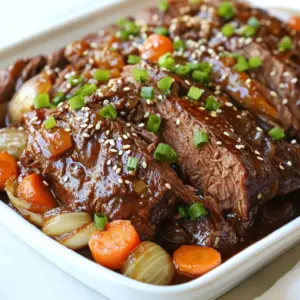 For a tasty Korean pot roast, you need: - 3 lbs beef chuck roast - 2 carrots, cut into chunks - 1 onion, quartered - 3 green onions, chopped (plus extra for garnish) The flavors come from these key items: - 1 cup soy sauce - 1/2 cup brown sugar - 1/4 cup sesame oil - 1 cup beef broth - 1 cup water - 1 tablespoon grated ginger - 4 cloves garlic, minced - 2 tablespoons gochugaru (Korean red pepper flakes) - Salt and pepper to taste These seasonings create a rich and deep flavor that makes the beef tender and juicy. To finish your dish, use: - 1 tablespoon sesame seeds - Chopped green onions These garnishes add a nice touch and make the dish look great. Enjoy the burst of flavors with every bite! {{ingredient_image_1}} First, gather your ingredients to make the marinade. In a large bowl, mix these items: - 1 cup soy sauce - 1/2 cup brown sugar - 1/4 cup sesame oil - 1 cup beef broth - 1 cup water - 1 tablespoon grated ginger - 4 cloves garlic, minced - 2 tablespoons gochugaru Whisk everything together until smooth. This marinade gives the beef great flavor. Next, take your beef chuck roast, which should weigh about 3 pounds. Place it in a large resealable bag or dish. Pour the marinade over the roast, ensuring it is fully covered. Seal the bag tightly or cover the dish. Let the beef marinate in the fridge for at least 4 hours. For even better taste, marinate it overnight. When you're ready to cook, take the roast out of the marinade. Pat it dry with a paper towel. This helps the meat brown better. In a large oven-safe pot, heat a tablespoon of oil over medium-high heat. Season the roast with salt and pepper. Sear it on all sides for about 4-5 minutes each. You want a nice brown crust to form. After searing, remove the roast and set it aside. In the same pot, add quartered onions and carrot chunks. Sauté these for about 3-4 minutes until they soften a bit. This step adds great flavor to your dish. Now, return the roast to the pot. Pour the reserved marinade over it and add chopped green onions. Bring the pot to a boil. Cover it with a lid or foil. Transfer the pot to a preheated oven at 300°F (150°C). Cook for about 3-4 hours. The roast should become fork-tender by the end. Once the roast is done, take it out of the oven and let it rest for 10-15 minutes. This resting time helps keep the meat juicy. Slice the roast and serve it with the veggies. Drizzle the sauce over the top. For a pretty finish, sprinkle with sesame seeds and extra green onions. Enjoy your flavorful Korean pot roast! Marinating is key to great flavor. Use a large resealable bag or dish. Pour the marinade over the beef and seal it tightly. Let it sit in the fridge for at least 4 hours. For the best taste, marinate overnight. This allows the meat to soak up all the flavors. Searing the roast adds a nice crust. Heat oil in your pot on medium-high heat. Remove the roast from the marinade and pat it dry. Season it with salt and pepper. Sear each side for about 4-5 minutes. This step creates a flavorful outer layer. To make sure your roast is fork-tender, use a low and slow cooking method. Cook it in the oven at 300°F (150°C) for 3-4 hours. Keep it covered to lock in moisture. Check for tenderness after the time is up. It should easily pull apart with a fork. For a beautiful presentation, slice the pot roast on a platter. Surround it with colorful veggies. Garnish with fresh green onions and sesame seeds. This adds color and texture to your dish. An appealing plate makes the meal even more enjoyable. Pro Tips Marinate Longer for More Flavor: For the best flavor, marinate the beef chuck roast overnight. This allows the spices and sauce to deeply penetrate the meat, resulting in a richer taste. Rest the Meat: After cooking, let the roast rest for 10-15 minutes before slicing. This helps the juices redistribute, ensuring a moist and tender result. Customize the Heat: Adjust the amount of gochugaru based on your heat preference. You can start with less and add more to taste if you prefer a spicier dish. Use Leftover Marinade: Don't discard the marinade after cooking! Reduce it on the stovetop to create a flavorful sauce to drizzle over the sliced roast and vegetables. {{image_2}} You can easily spice up your Korean pot roast. Just add more gochugaru. Start with an extra tablespoon for a nice kick. If you love heat, try two extra tablespoons. The red pepper flakes will give a bold flavor and a warming sensation. This change makes the dish exciting for those who enjoy spicy food. Feel free to add more veggies to your pot roast. You can include mushrooms, bell peppers, or zucchini. These will add color and nutrients to your meal. Just chop them into chunks and add them with the carrots and onions. This way, you'll create a more balanced dish that tastes great. If you want to try a different cut of meat, go for brisket or short ribs. These cuts bring their own rich flavors to the dish. They may take a bit longer to cook, but the result is worth it. Searing these cuts still works well, just like with the chuck roast. Experiment with what you like best! To store leftover Korean pot roast, let it cool down first. Place the roast in an airtight container. Add any leftover vegetables and sauce to the container. Seal it well to keep air out. Store it in the fridge for up to three days. Make sure to label it with the date for easy tracking. If you want to keep it longer, freezing is a great option. Cut the roast into smaller pieces for easier thawing. Wrap each piece tightly in plastic wrap. Then, place the wrapped pieces in a freezer bag. Remove as much air as possible before sealing. You can freeze it for up to three months. When you’re ready to eat, just thaw it overnight in the fridge. Reheating Korean pot roast is simple. You can use the oven, stovetop, or microwave. For the oven, preheat it to 350°F (175°C). Place the roast in an oven-safe dish and cover it with foil. Heat for about 20-30 minutes, or until warmed through. On the stovetop, use a skillet with a bit of broth or water to keep it moist. Heat on low and stir often. If using the microwave, slice the roast and place it in a microwave-safe dish. Cover it and heat in short intervals, stirring in between, until hot. Yes, you can. To make it in a slow cooker, sear the beef first. Then, place it in the slow cooker with the marinade and veggies. Cook on low for 6-8 hours. This will give you a tender roast with rich flavors. You can marinate the beef for at least 4 hours. For the best taste, try marinating it overnight. This allows the flavors to soak in deeply. You can serve Korean Pot Roast with rice or noodles. Steamed veggies also pair well. For a crunchy side, try pickled vegetables. Each adds a nice touch to your meal. Yes, you can use other cuts. Brisket and round roast work well too. Just remember that cooking times may change. Always check for tenderness. Not really. The dish has some heat from gochugaru, but it’s mild. If you like more spice, add extra gochugaru to the marinade. This will give you a bolder flavor. You now have all the key steps to make a delicious Korean pot roast. We discussed the main ingredients, seasonings, and garnishes. I laid out clear instructions for marinating, searing, and cooking. I shared helpful tips for perfecting your dish. Plus, I covered fun variations and storage methods. As you create this meal, remember to enjoy the process. Food brings people together. This dish not only tastes great but also offers warmth and comfort. Happy cooking!